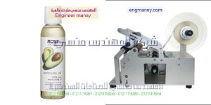 ماكينة لصق استيكر ليبل نصف أتوماتيك علي عبوات الكحل الإثيلي والمنتجات الطبية ماركة ام توباك