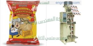 ماكينة تعبئة اللب الخشب فى اكياس من شركة المهندس منسي لماكينات التعبئة و التغليف